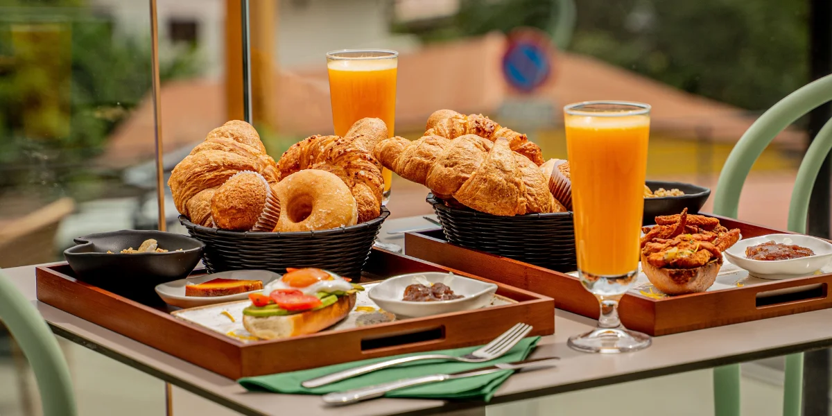 La Zula's brunch, featuring pastries, toasts, yogurt, and dessert