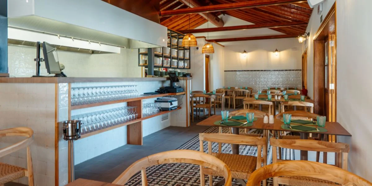 La Zula restaurant dining room with several tables and chairs set for dining